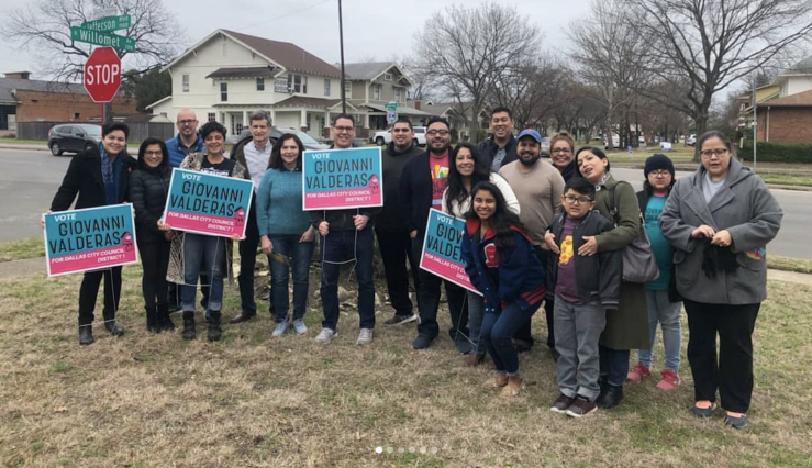 A group photo of many Valderas supporters holding campaign signs